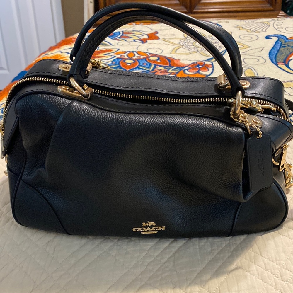Medium Black coach bag with handle and strap. 13wX6L and 8 in deep